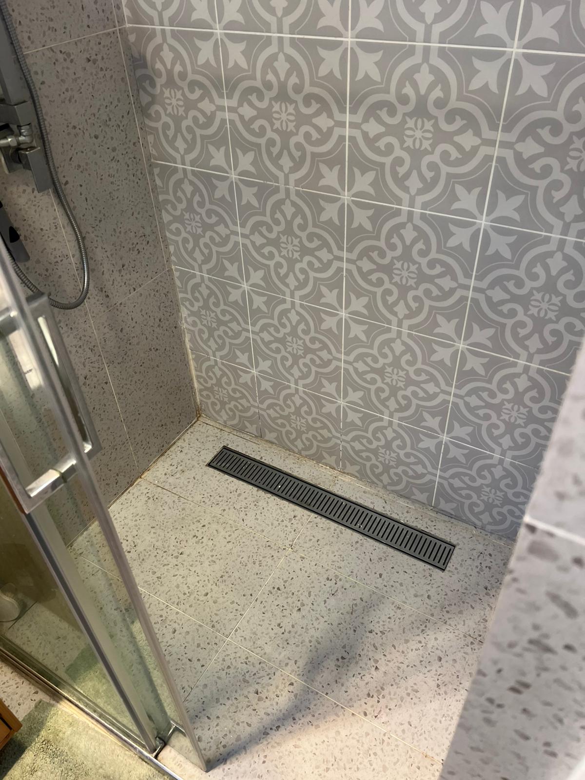 Gold Coast shower regrouting - after: fresh white epoxy grout with professional waterproof sealing